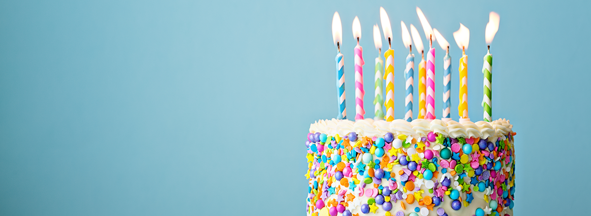 A birthday cake with colorful candles.